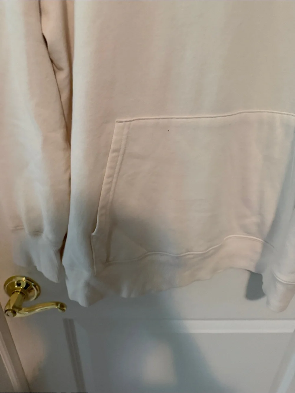 The North Face Cream Hoodie with Black Logo